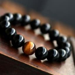 image-Natural Black Onyx With Stone Tiger Eyes Energy Bracelet