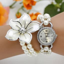 image-New Fashion Women Dress Watches Ladies Pearl Chain White Flower Bracelet Quartz Wristwatches Women Rhinestone Watches
