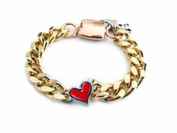 image-Gold chain bracelet with red heart shaped charm