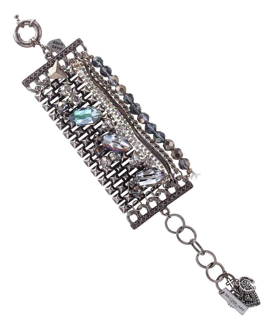 image-Banded bracelet features iridescent blue beads that dazzle in the