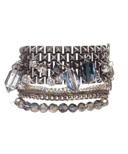 image-Banded bracelet features iridescent blue beads that dazzle in the