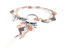 image-Multi chain flower bracelet with studs.