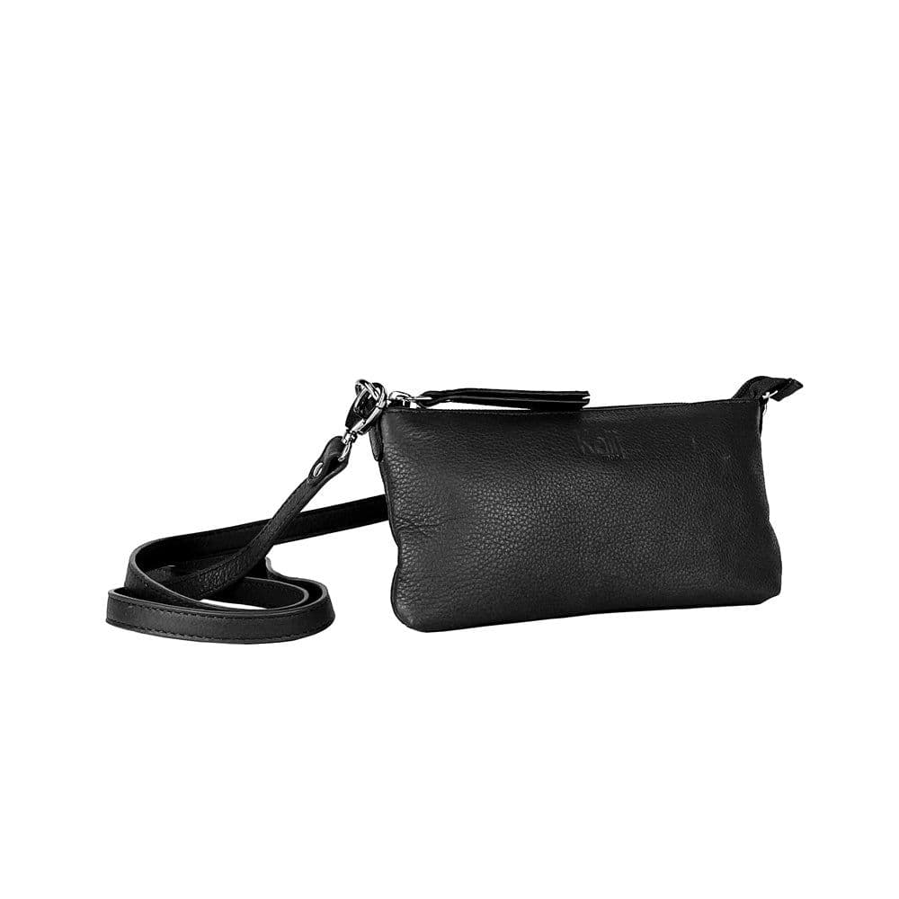 image-K0013AB | Tracollina Donna in Vera Pelle pieno fiore, con leggera grana. Tracolla removibile. Accessori Nickel Lucido. Colore Nero. Dimensioni: cm 20 x 10,5 x 2. Confezione: Sacchetto Tnt
