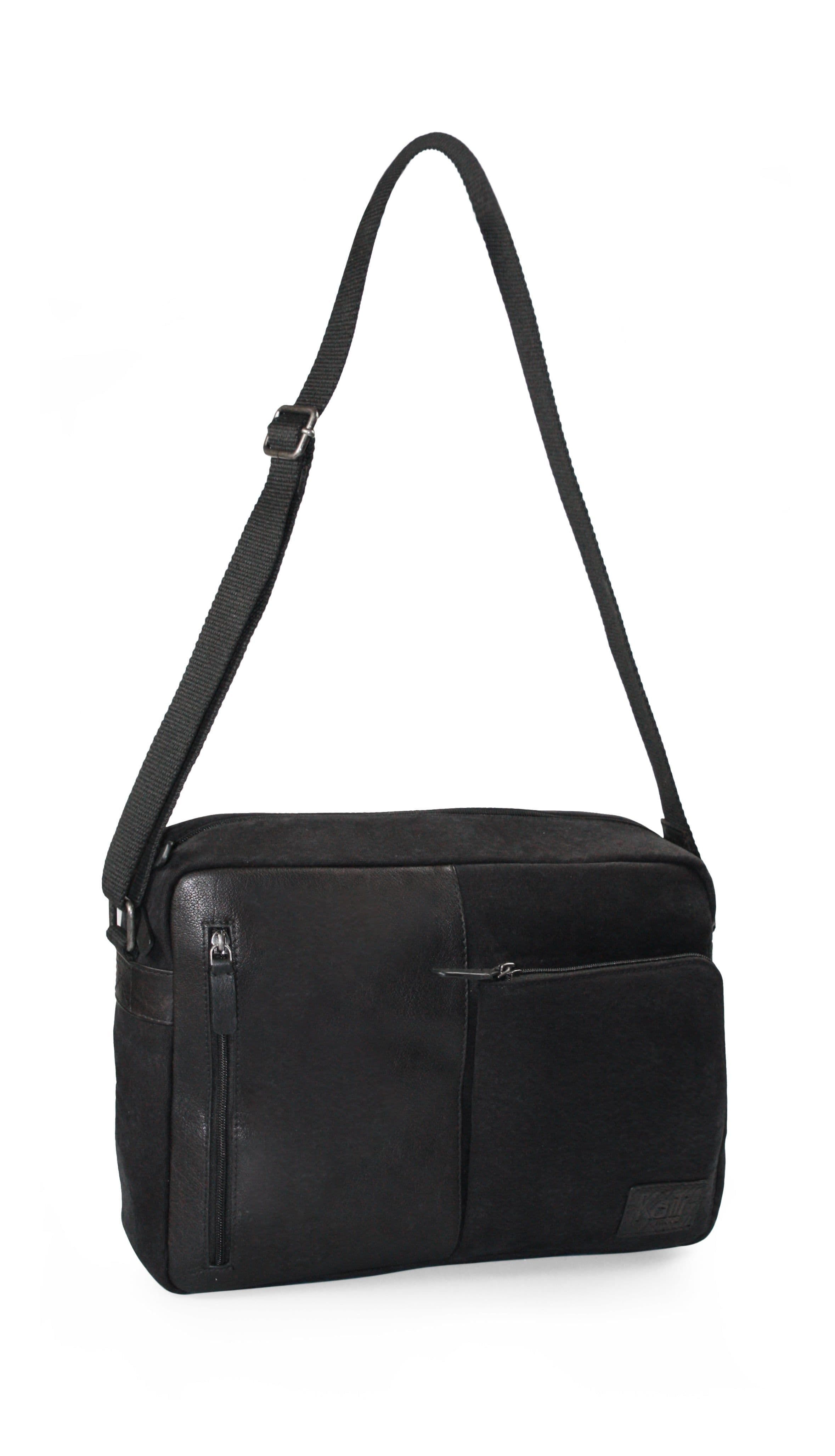 image-K0022AB | Messenger in Canvas/Vera Pelle, pieno fiore, volanata - Colore Nero. Accessori Nickel Anticato, Chiusura superiore con lampo. Dimensioni: cm 35 x 26 x 10. Confezione: Sacchetto Tnt