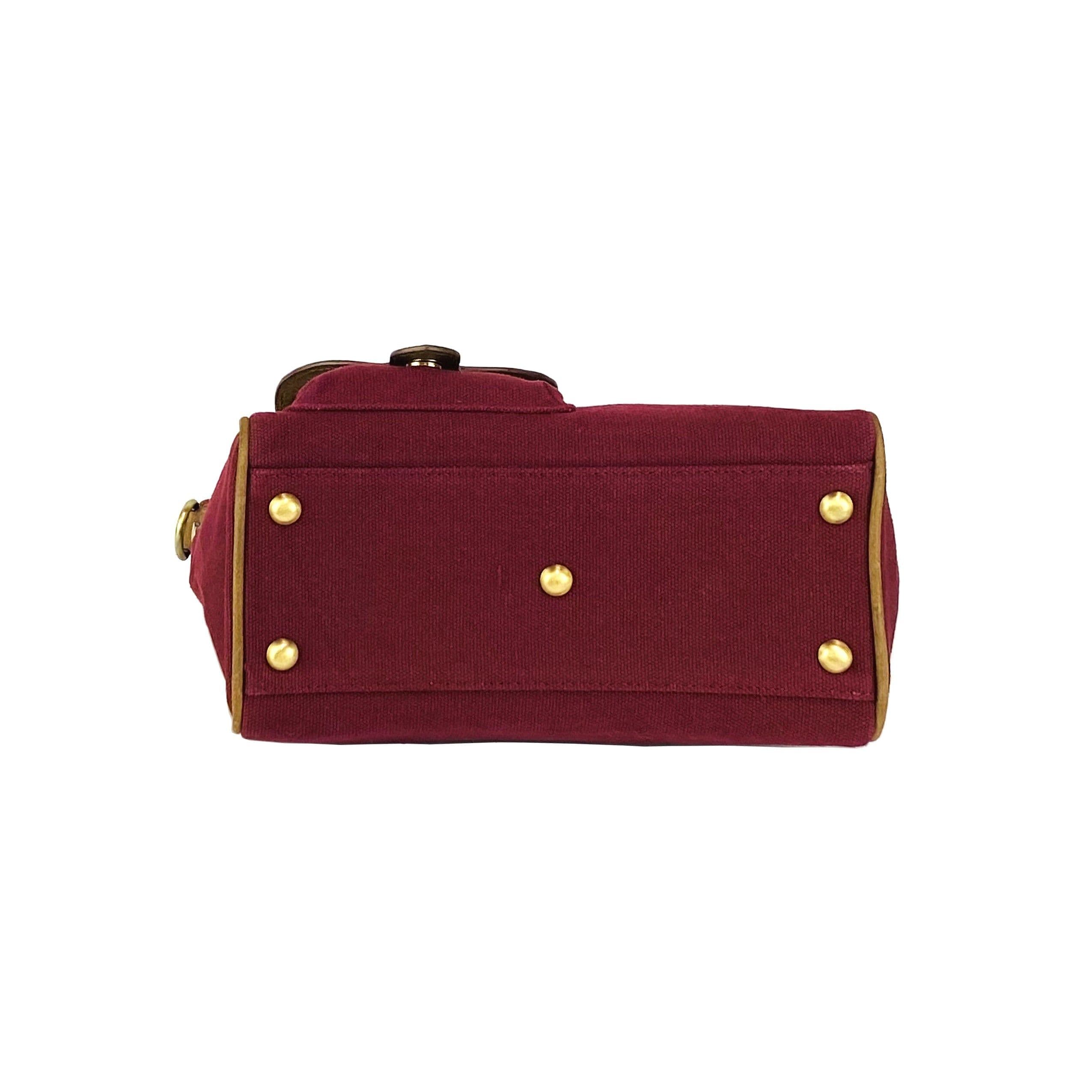 image-K0042XCB | Mini Handbag in Canvas/Genuine Leather Made in Italy. Removable shoulder strap. Attachments with metal snap hooks in Antique Brass - Bordeaux color - Dimensions: 24 x 20 x 12 cm