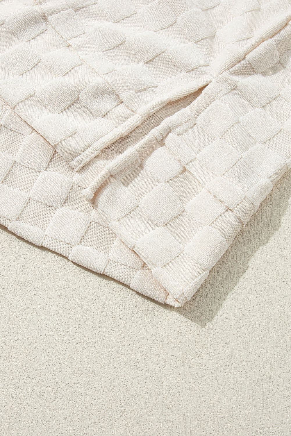 image-Beige Solid Textured Thumbhole Sleeve Top