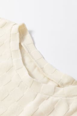 image-Beige Solid Textured Thumbhole Sleeve Top