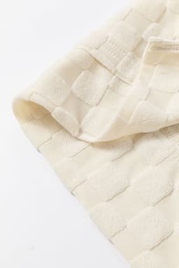 image-Beige Solid Textured Thumbhole Sleeve Top