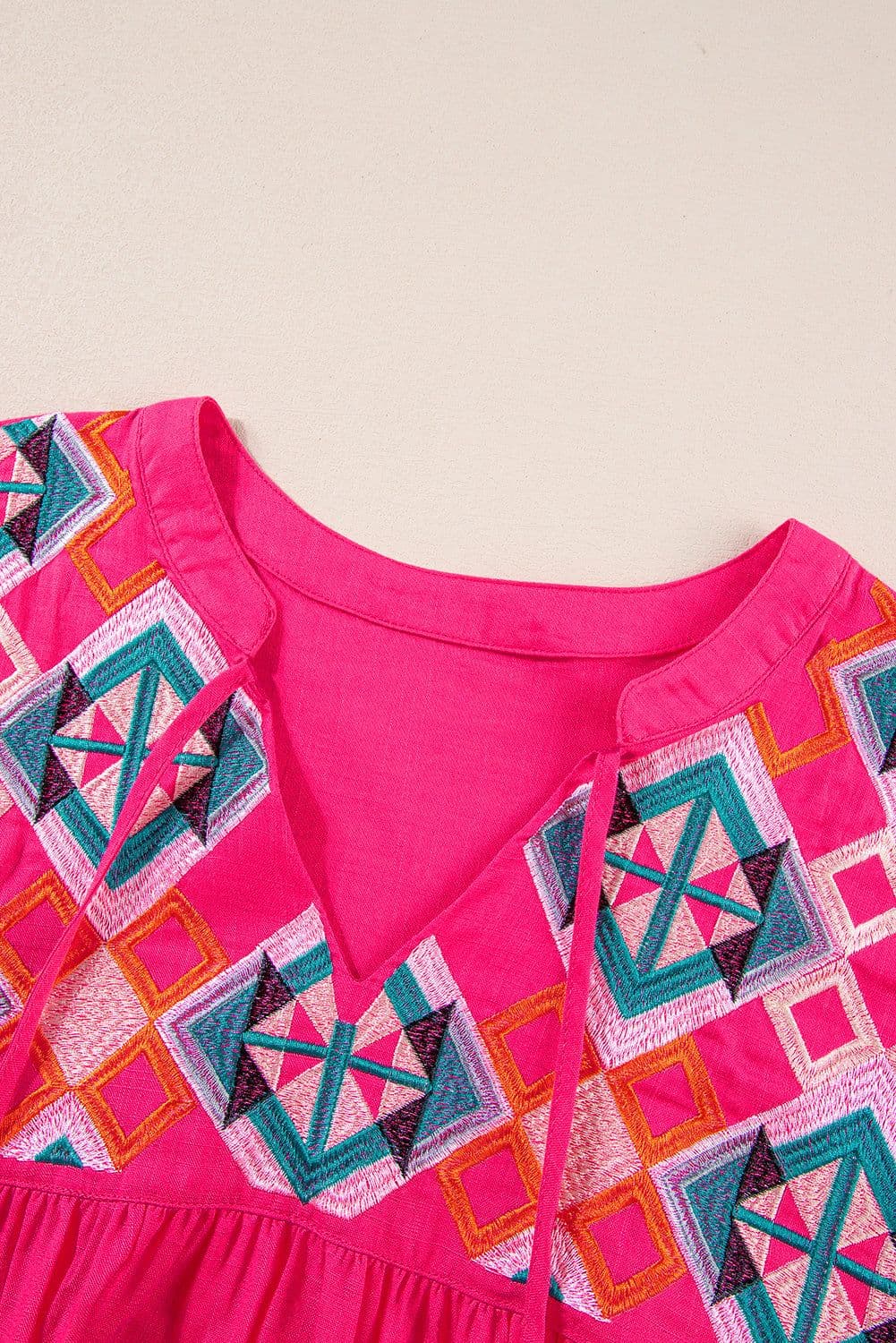 image-Strawberry Pink Geometric Embroidered Tassel Tie V Neck Blouse