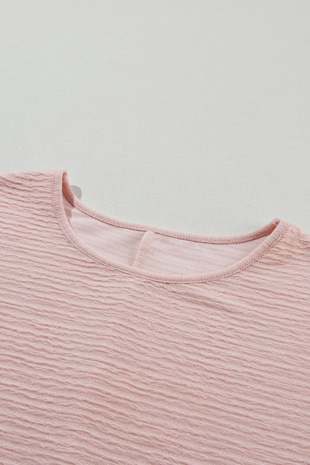 image-Light Pink Solid Textured Ruffled Short Sleeve Blouse