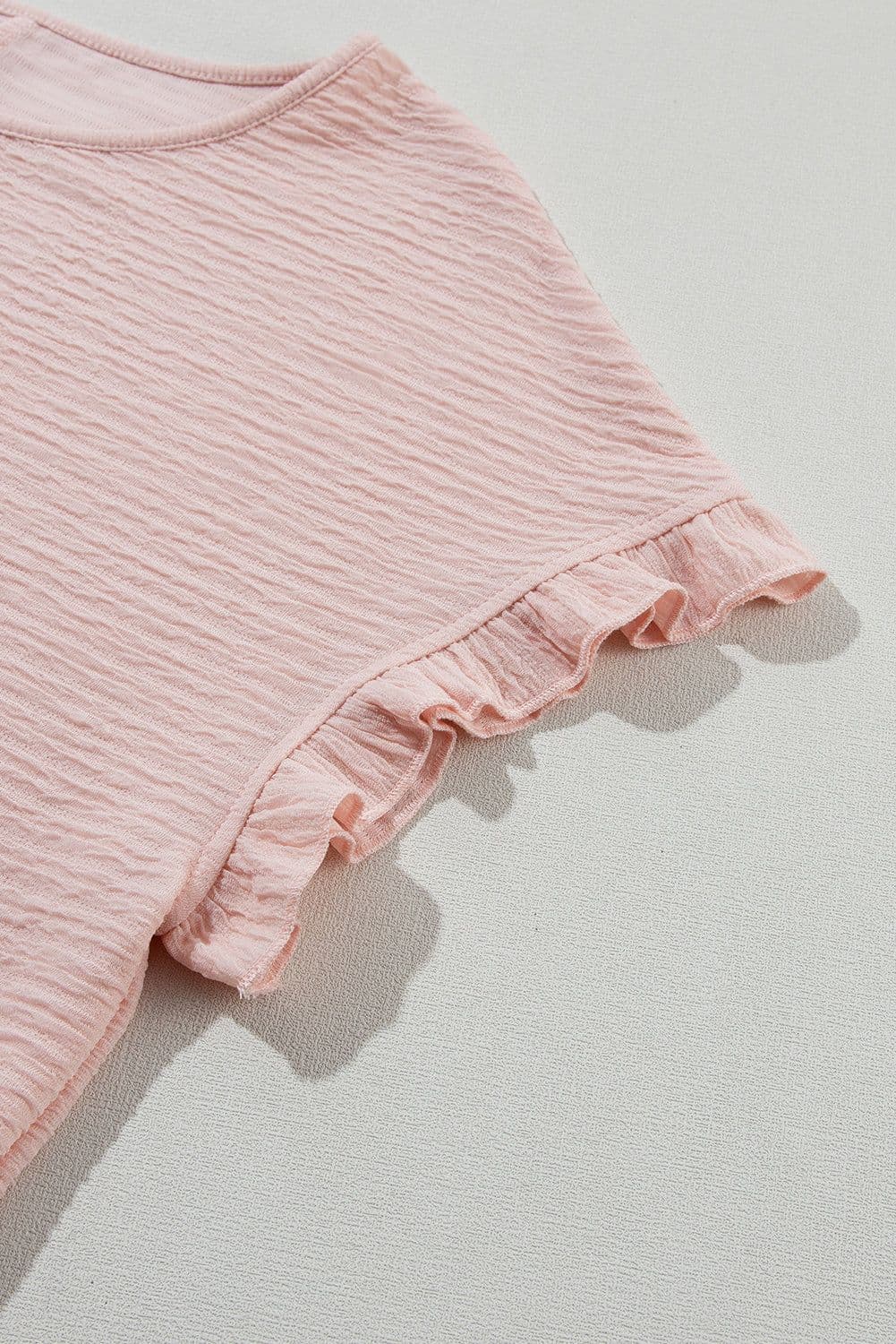 image-Light Pink Solid Textured Ruffled Short Sleeve Blouse