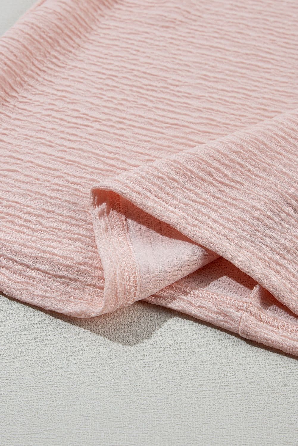 image-Light Pink Solid Textured Ruffled Short Sleeve Blouse