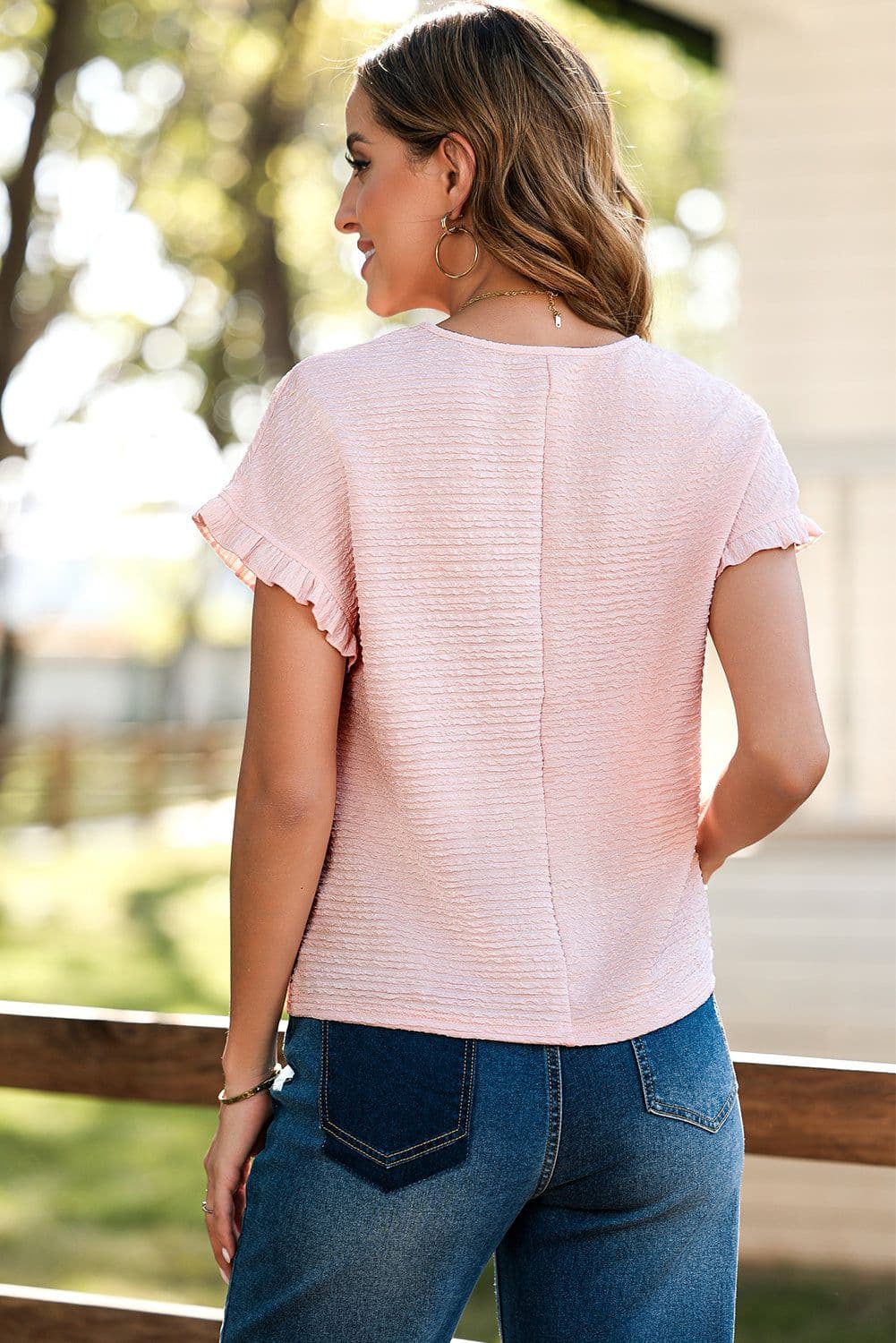 image-Light Pink Solid Textured Ruffled Short Sleeve Blouse