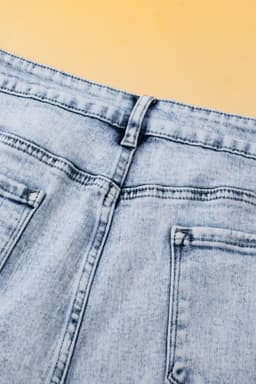 image-Light Blue Acid Wash Crossed Raw Edge Denim Shorts