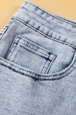 image-Light Blue Acid Wash Crossed Raw Edge Denim Shorts