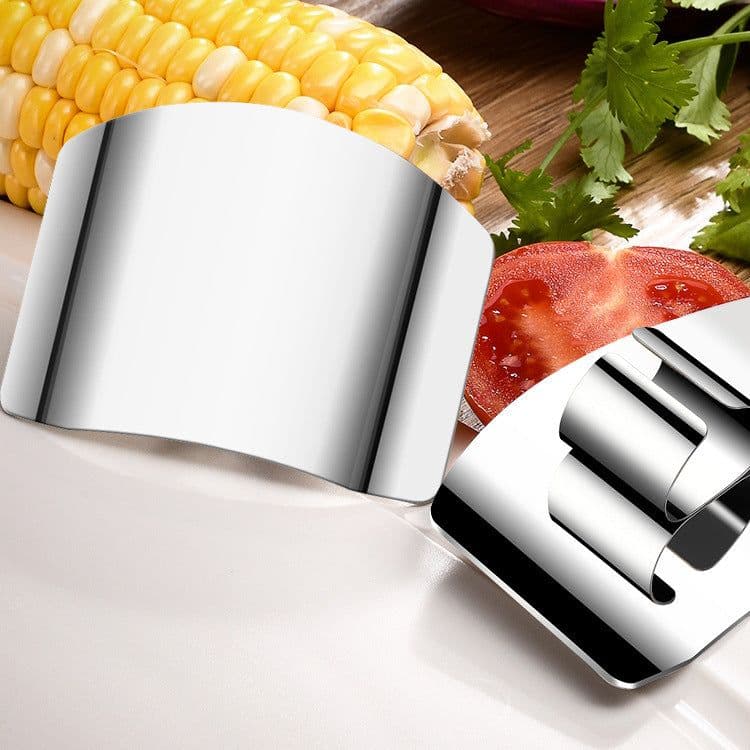 image-Manufacturers supply stainless steel vegetable cutting hand guards finger guards finger guards finger guards finger kitchen tools