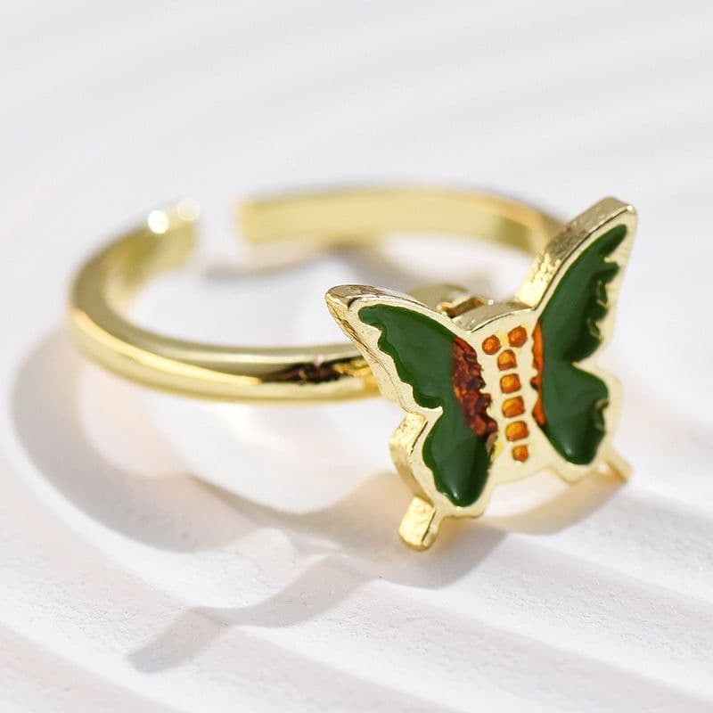 image-Adjustable Rotatable Five-Petal Flower Butterfly Ring - European Style