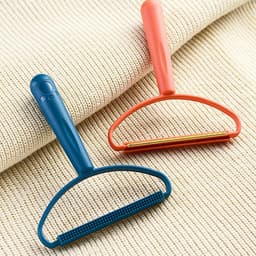 image-Orange Dual-Sided Hair Roller - Pet Clothes Scraper, Portable