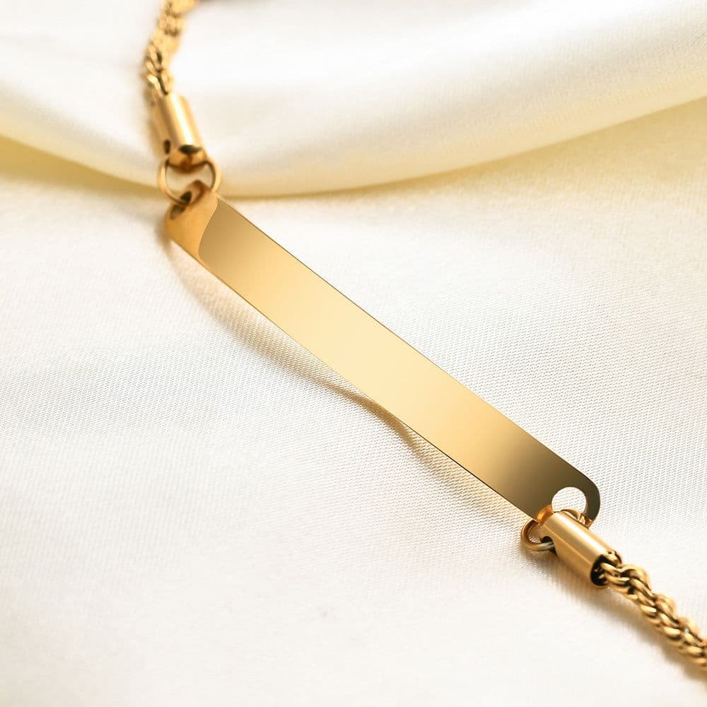 image-Trendy QUR Gold Stainless Steel Bracelet, Women's Curved Twist, Engrave Logo