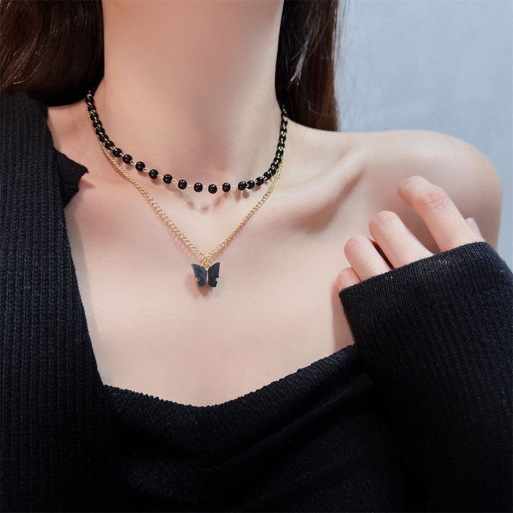 image-Emily Black Pearl Butterfly Necklace - Retro