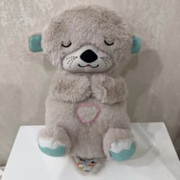 image-Breathing Bear Otter Plush Toy - Soothing Sleep Doll
