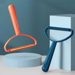 image-Orange Dual-Sided Hair Roller - Pet Clothes Scraper, Portable
