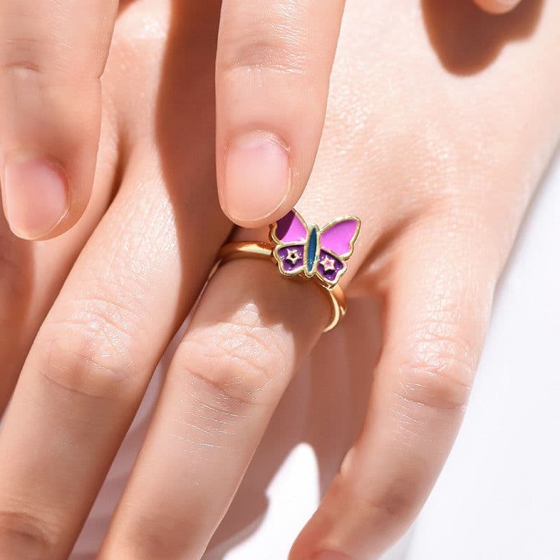 image-Adjustable Rotatable Five-Petal Flower Butterfly Ring - European Style