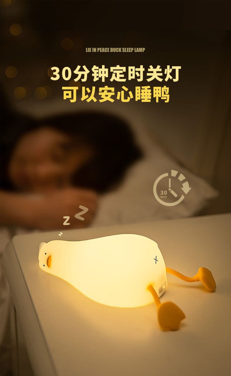 image-Lying Flat Turning Duck Night Light Fun Creative Silicone LED Night Light USB Charging Mobile Phone Holder Gift for Children