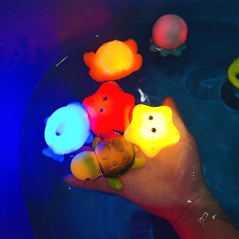image-Cross-border induction light-emitting animal floating water light net fishing fish play water toy children's baby bath vinyl toy