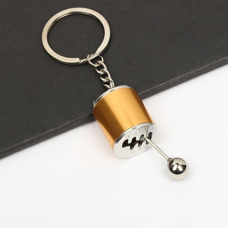 image-Cross-border wholesale car modification key chain speed and passion key male car pendant metal gear key chain