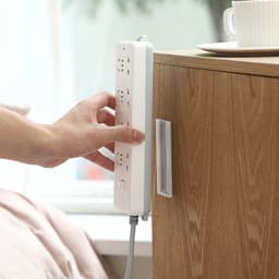image-Plug-in Socket Organizer - Orange Wall Mount