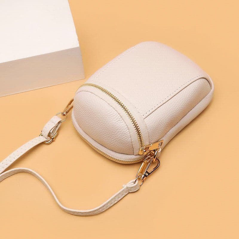 image-Mobile phone crossbody bag - high-end cowhide, fashionable 2023