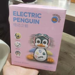 image-Electric Swinging Penguin Toy - Music Light Baby
