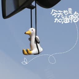 image-Swing Duck Car Pendant Aroma Diffuser