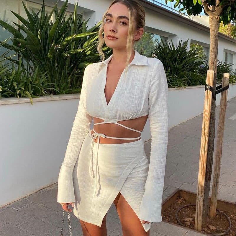 image-European and American women's clothing 2022 summer new fashion cardigan long-sleeved lapel top slim short skirt suit wholesale