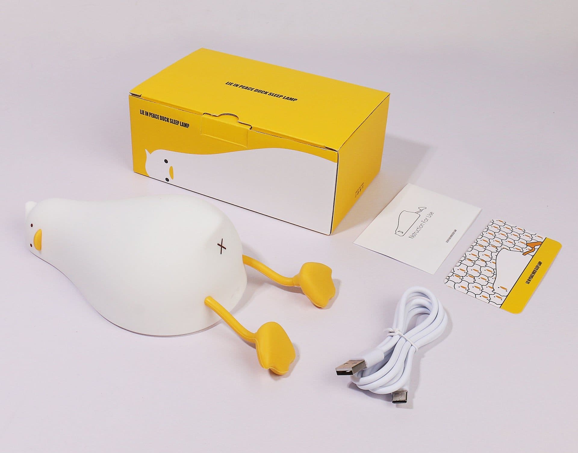 image-Lying Flat Turning Duck Night Light Fun Creative Silicone LED Night Light USB Charging Mobile Phone Holder Gift for Children
