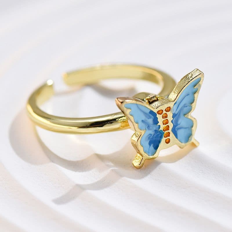 image-Adjustable Rotatable Five-Petal Flower Butterfly Ring - European Style