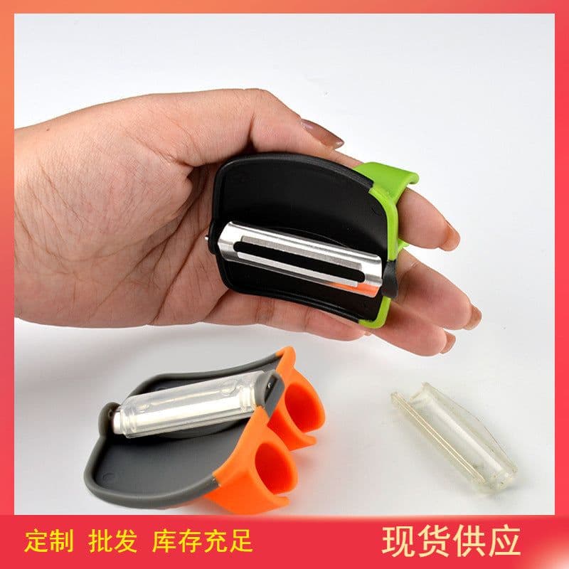 image-Melon Peeler Stainless Steel - Green & Red