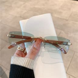 image-Spot wholesale fashion sunglasses European and American cross-border men's and women's frameless imitation wood grain temples sunglasses sunglasses