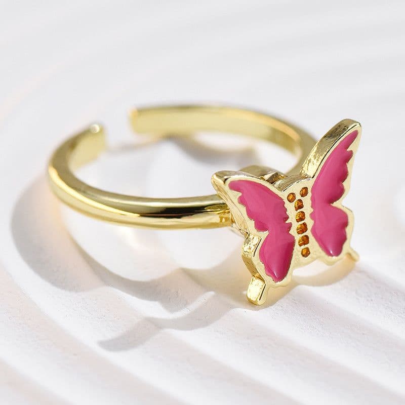 image-Adjustable Rotatable Five-Petal Flower Butterfly Ring - European Style