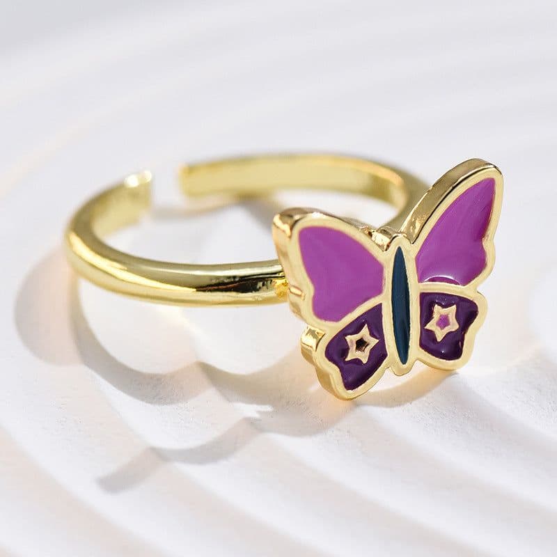 image-Adjustable Rotatable Five-Petal Flower Butterfly Ring - European Style