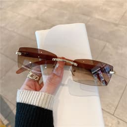 image-Spot wholesale fashion sunglasses European and American cross-border men's and women's frameless imitation wood grain temples sunglasses sunglasses