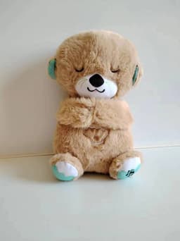 image-Breathing Bear Otter Plush Toy - Soothing Sleep Doll