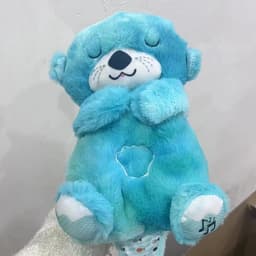 image-Breathing Bear Otter Plush Toy - Soothing Sleep Doll