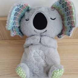 image-Breathing Bear Otter Plush Toy - Soothing Sleep Doll
