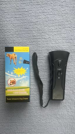 image-Portable Ultrasonic Dog Repeller Flashlight - Black