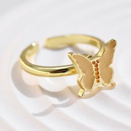 image-Adjustable Rotatable Five-Petal Flower Butterfly Ring - European Style