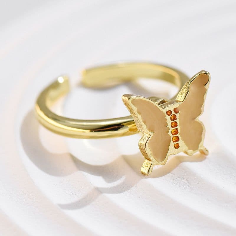 image-Adjustable Rotatable Five-Petal Flower Butterfly Ring - European Style