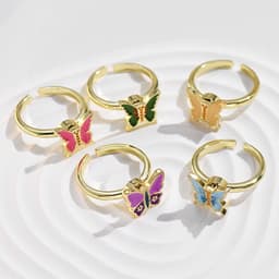 image-Adjustable Rotatable Five-Petal Flower Butterfly Ring - European Style