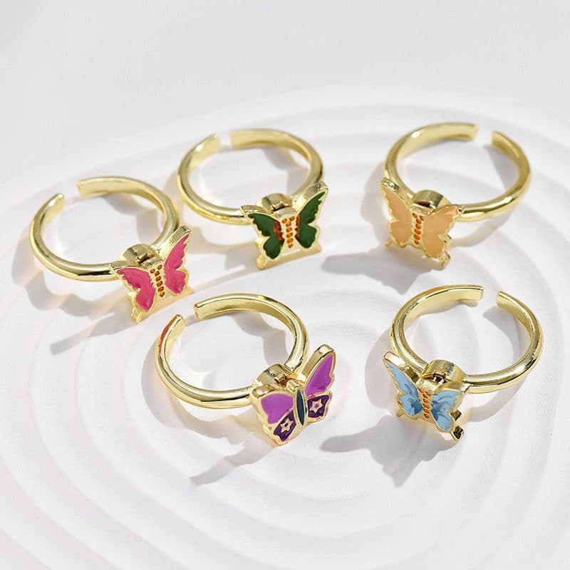 image-Adjustable Rotatable Five-Petal Flower Butterfly Ring - European Style